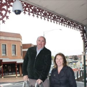 Right: In 2010, Catherine King MP posed for photos of the new security camera (upper left) on the McDonalds’ building on Bakery Hill, Ballarat, installed under virtually the same program as just re-announced in the 2014 budget.